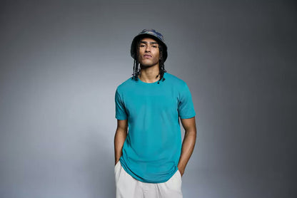 Model wearing the Anthem AM10 Organic T-Shirt